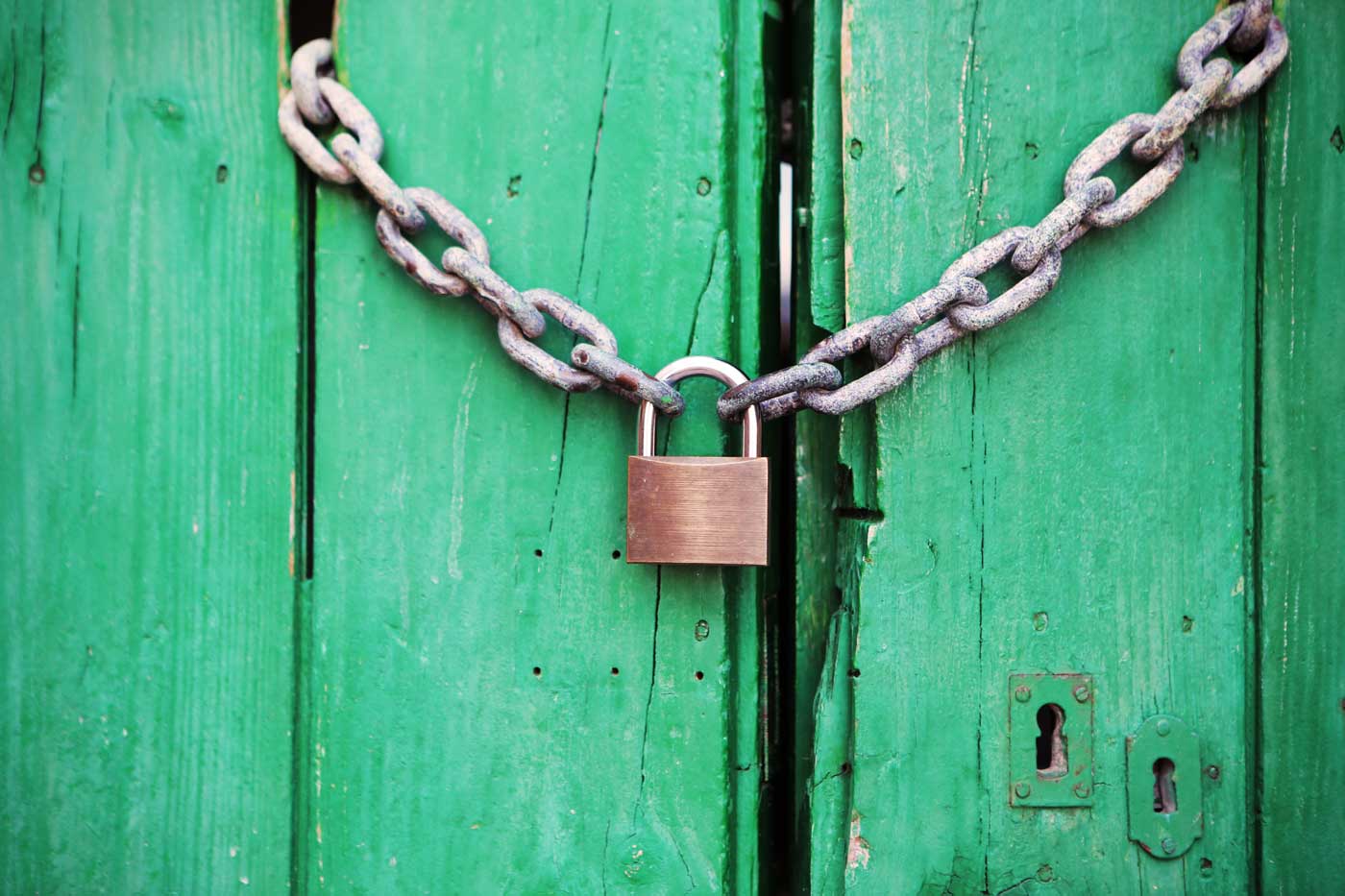 Chain with Lock on Green Door