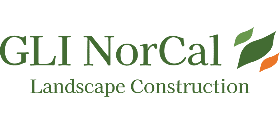 GLI NorCal Landscape Construction logo in green text, with two green leaf graphics and one orange leaf graphic on the right side.