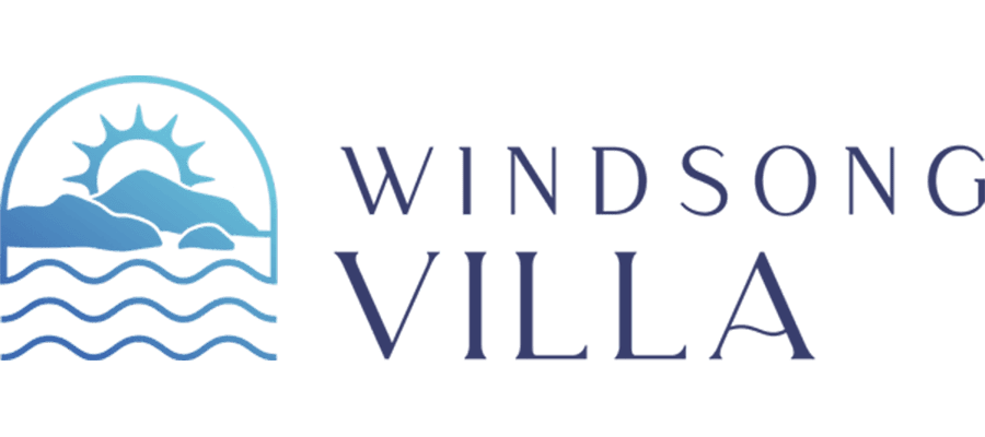 Logo for Windsong Villa with a stylized sun rising over mountains and ocean waves, next to the words “Windsong Villa” in elegant blue lettering.