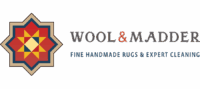 Star-Shaped Geometric Rug Pattern On The Left; To The Right, “Wool &Amp; Madder” Is Written In Large Letters, And Below, In Blue Text, “Fine Handmade Rugs &Amp; Expert Cleaning.”.